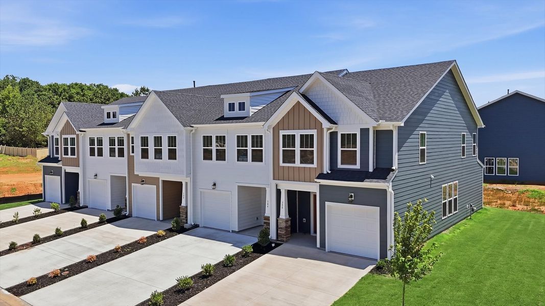 Refined exterior design with balanced architectural detail in this distinguished two-story villa by DRB Homes Refined exterior design with balanced architectural detail in this distinguished two-story villa by DRB Homes