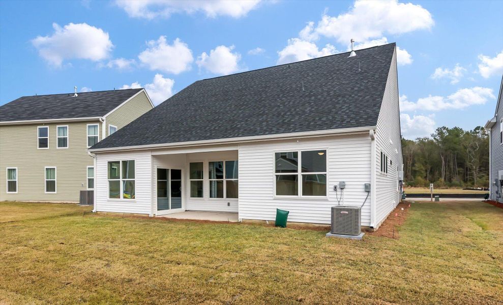 Exterior details and patio area of a home in Oakley Pointe, Moncks Corner (Image 3).