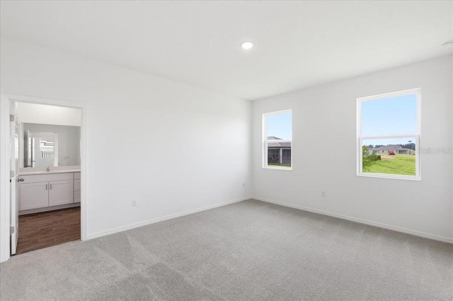 Spacious, unfurnished interior of a new home in Highfield at Twisted Oaks, Wildwood (Image 11).