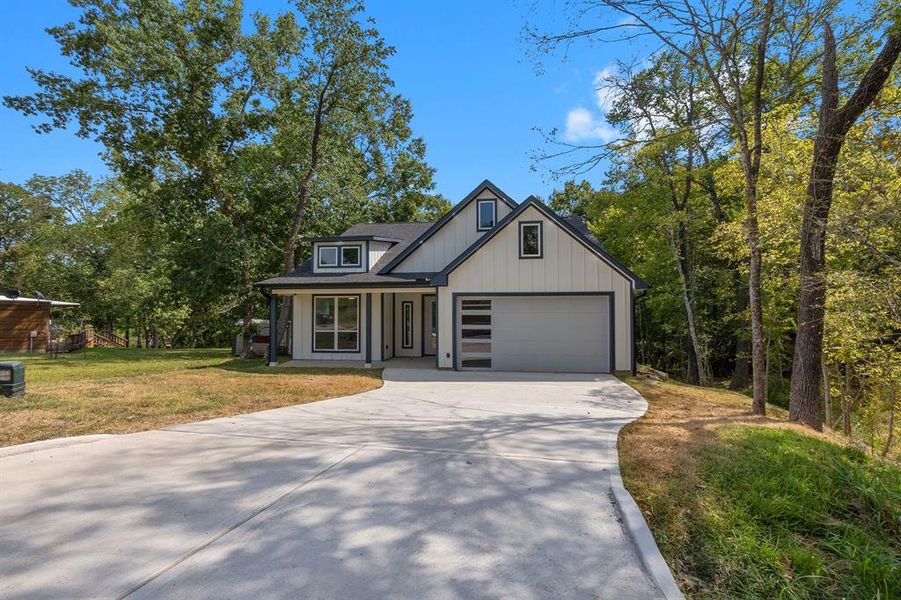 There is a two car attached garage along with plenty of driveway parking