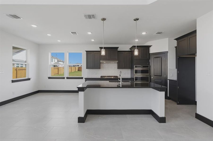 Representative furnished interior of a home built from the Bennington 2434 S 3CG by Saratoga Homes in Turnbo Ranch, Killeen (Image 5).