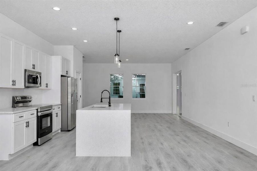 Furnished interior view inside a new home in , Ocala (Image 9).