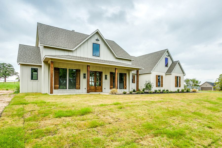 Representative exterior photo of a completed home built from the Manor Farm House by Trinity Classic Homes in Zion Trails, Poolville, TX (Image 16). Representative exterior photo of a completed home built from the Manor Farm House by Trinity Classic Homes in Zion Trails, Poolville, TX (Image 16).