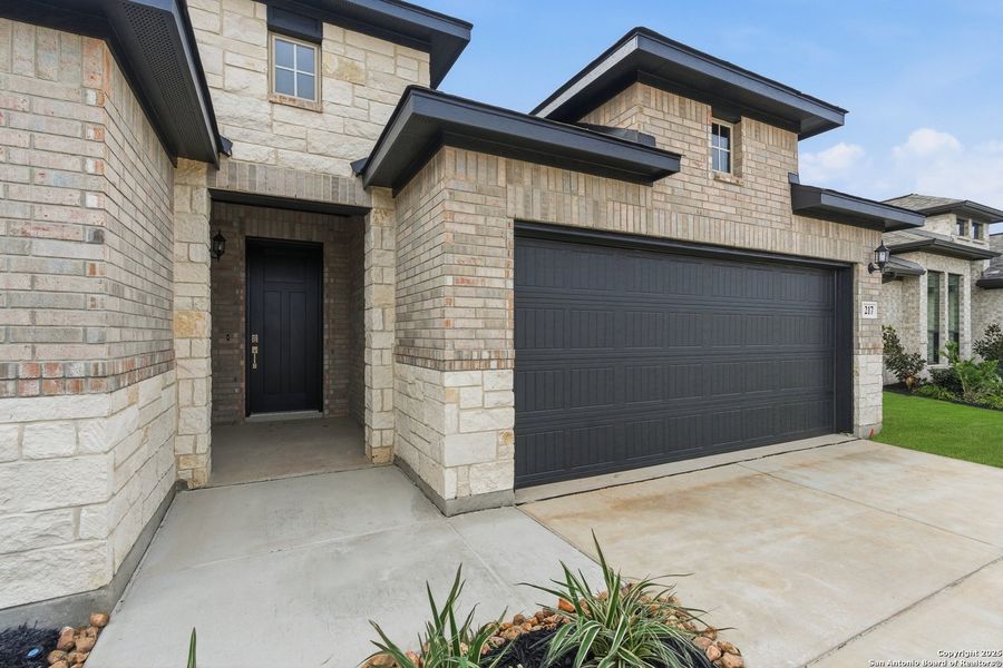 Exterior details and patio area of a home in Alsatian Oaks, Castroville (Image 26).