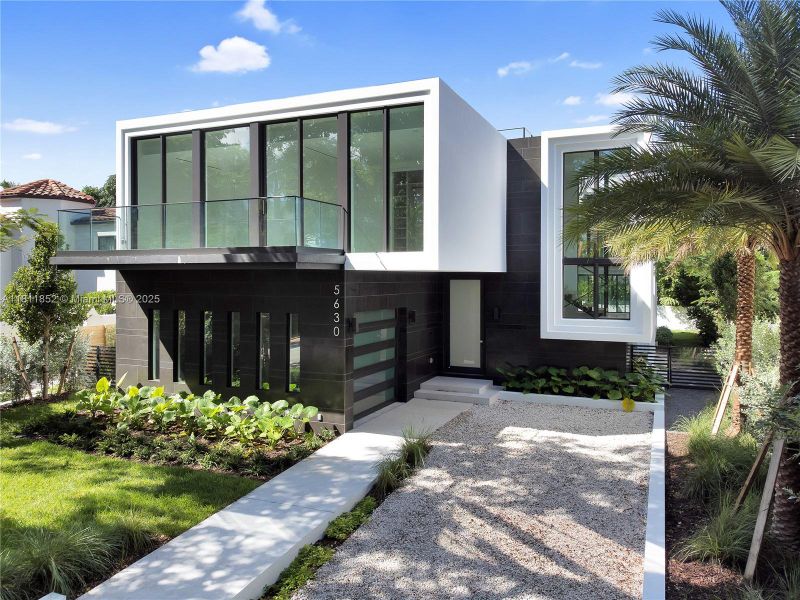 Front exterior of a new home in , Miami Beach, FL, highlighting curb appeal (Image 27). Front exterior of a new home in , Miami Beach, FL, highlighting curb appeal (Image 27).