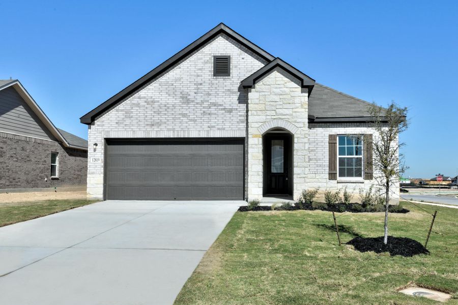 Representative exterior photo of a completed home built from the Hadley by Ashton Woods in The Summit at Saddlebrook Ranch 55's, Schertz, TX (Image 2). Representative exterior photo of a completed home built from the Hadley by Ashton Woods in The Summit at Saddlebrook Ranch 55's, Schertz, TX (Image 2).