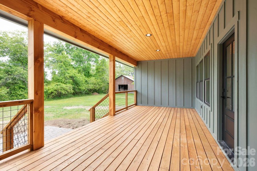 Exterior details and patio area of a home in , Mills River (Image 28).