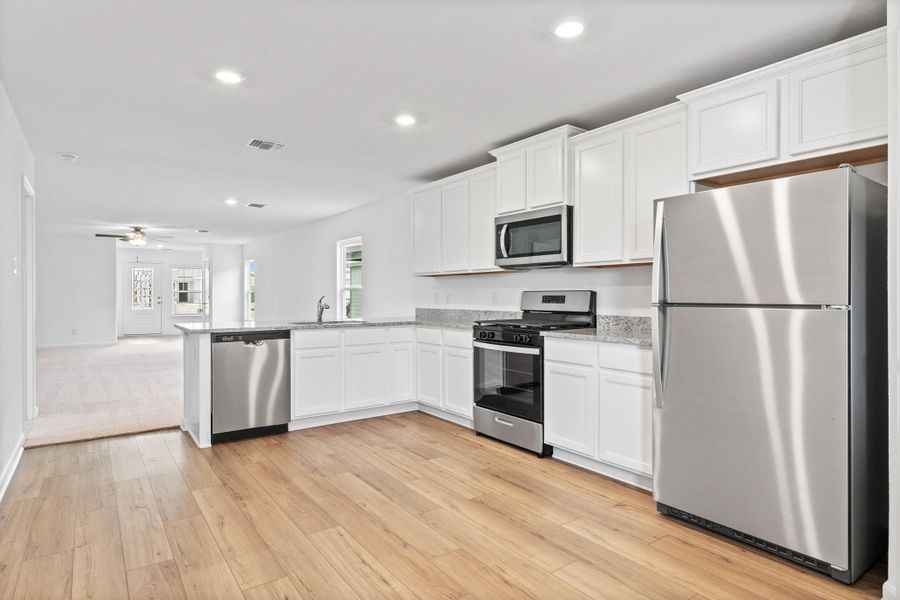 Furnished interior view inside a new home in Sunset Oaks, Maxwell (Image 4). Furnished interior view inside a new home in Sunset Oaks, Maxwell (Image 4).
