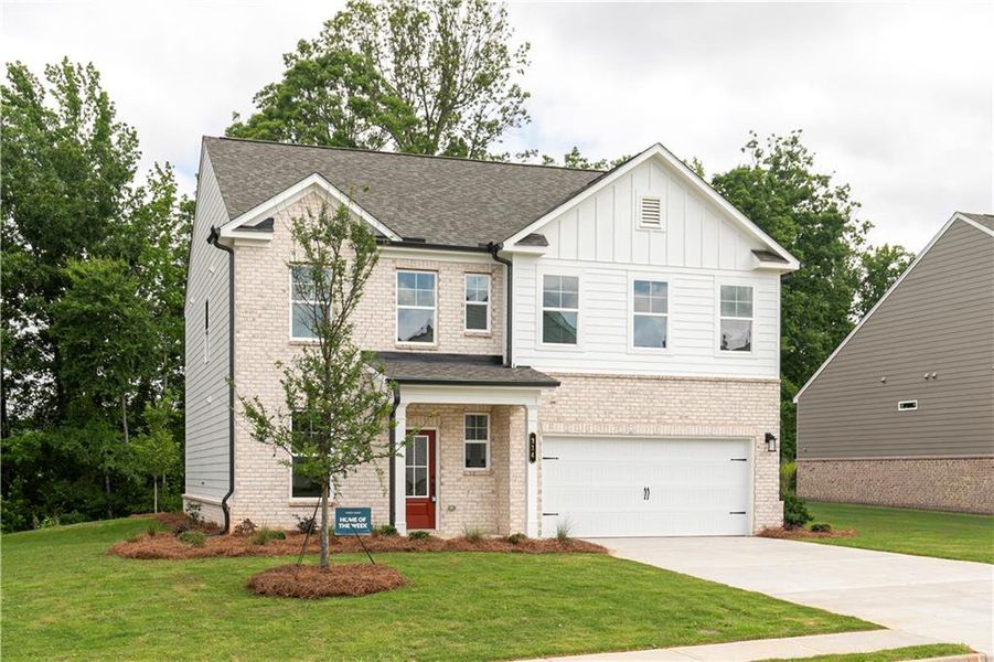 Front exterior of a new home in Rhodes Glen, Lawrenceville, GA, highlighting curb appeal (Image 24).