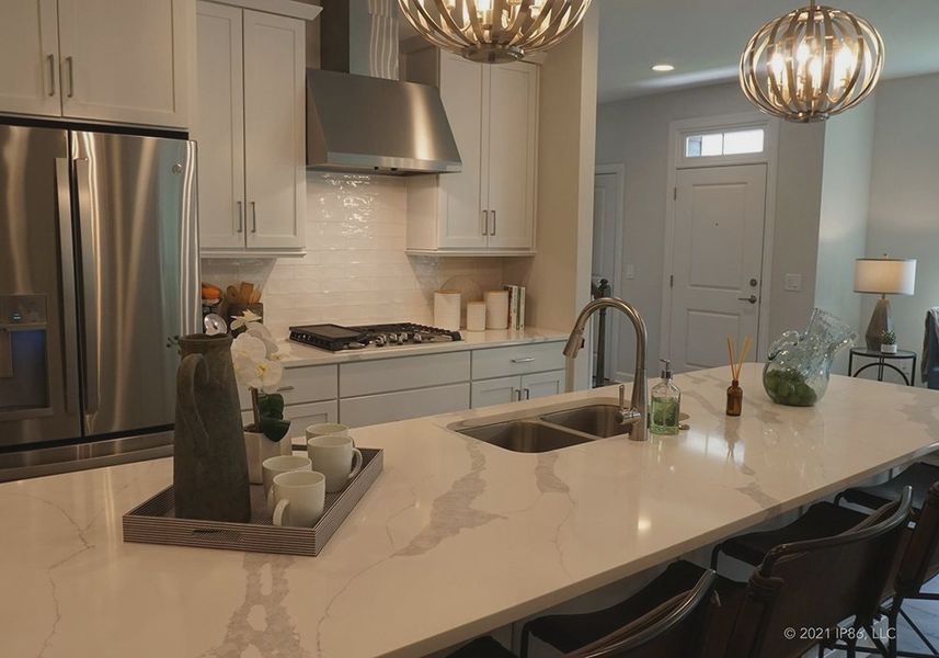 Representative furnished interior of a home built from the Kingston by Epcon Communities in The Courtyards at Oak Grove, Durham (Image 11).