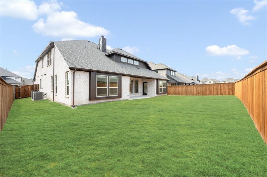Exterior details and patio area of a home in Terracina, Rockwall (Image 23). Exterior details and patio area of a home in Terracina, Rockwall (Image 23).