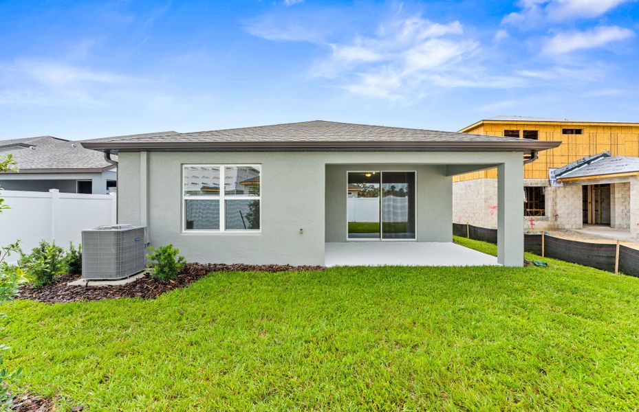 Exterior details and patio area of a home in Caldera, Spring Hill (Image 4).