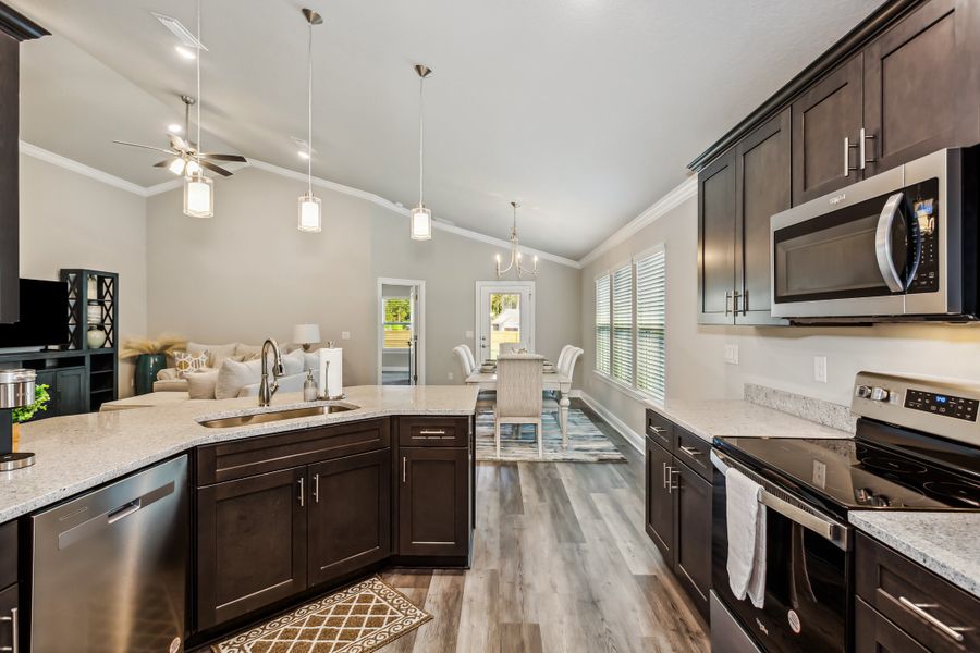 Representative furnished interior of a home built from the The Carlos by Herbst Homes in Doyle Hawkins Landing, Navarre (Image 39).