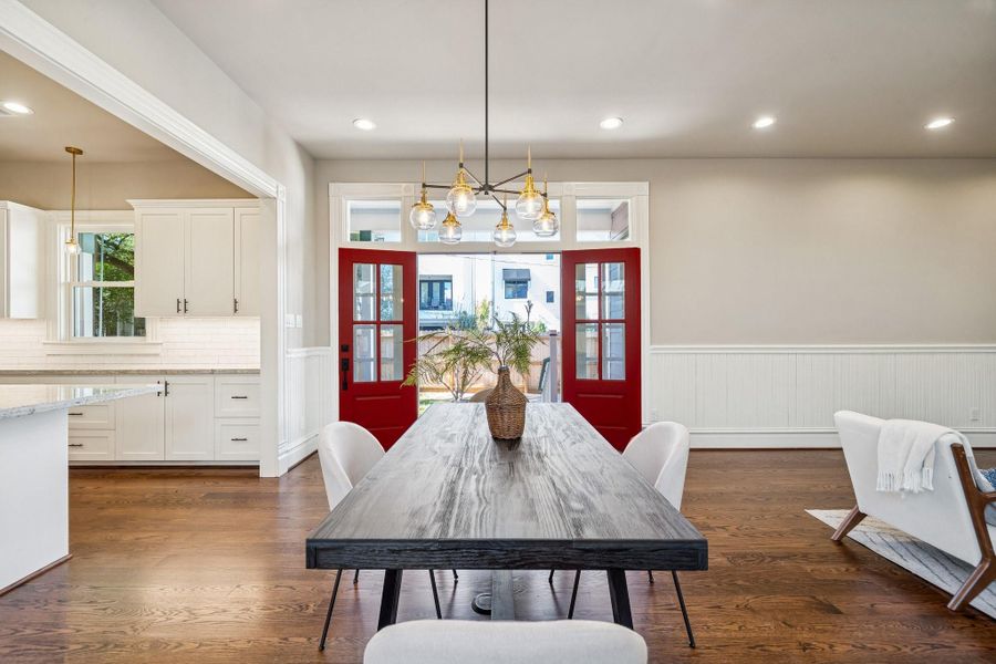 French doors lead out to the side yard (possible pool!) from the Dining area. Plenty of natural light through the doors, sidelights and transom windows! French doors lead out to the side yard (possible pool!) from the Dining area. Plenty of natural light through the doors, sidelights and transom windows!