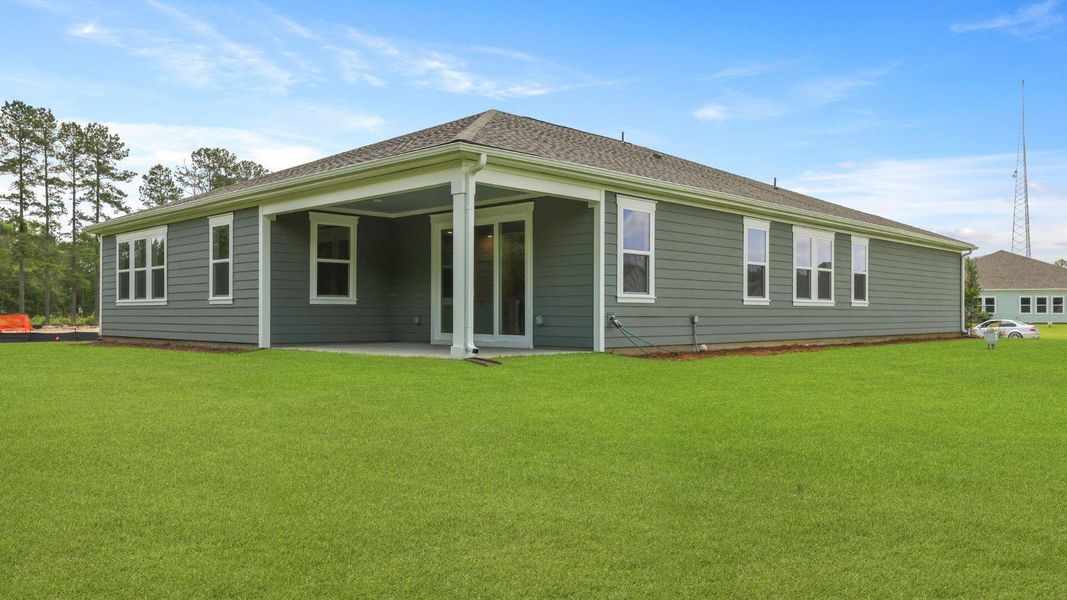 Front exterior of a new home in Berkeley Bay, Ridgeville, SC, highlighting curb appeal (Image 22).