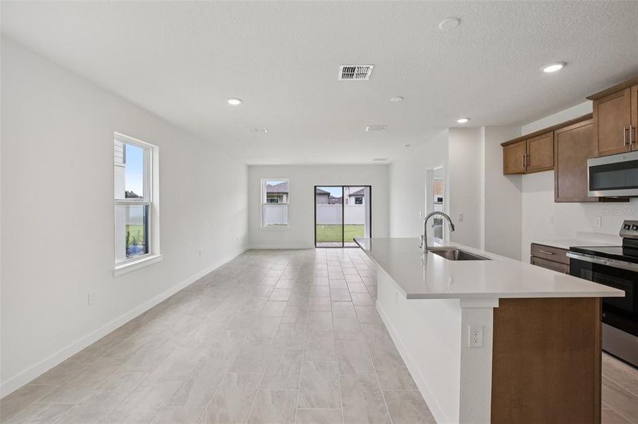 Furnished interior view inside a new home in Grasslands West, Lakeland (Image 9).