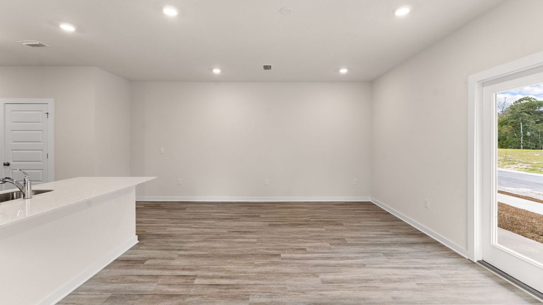 Representative unfurnished interior of a home built from the Palm Exterior by D.R. Horton in Genoa Landing Townhomes, Freeport (Image 18).