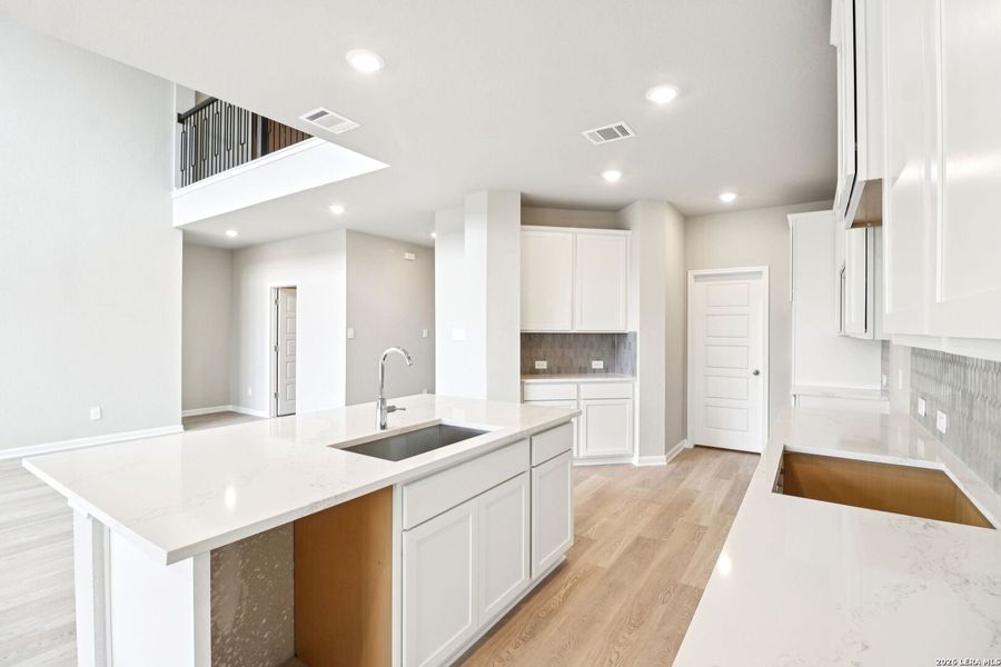 Furnished interior view inside a new home in Estancia Ranch - Classic Series, San Antonio (Image 14).