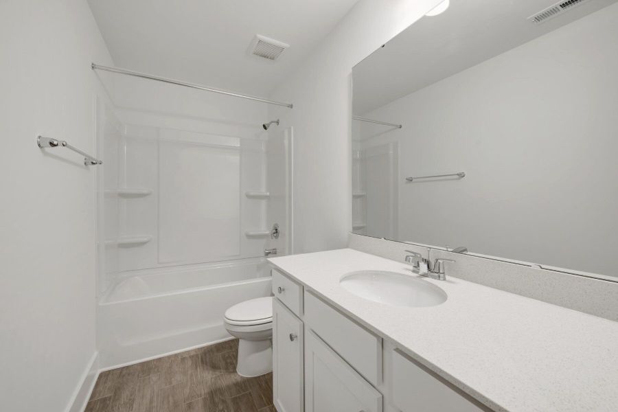 Furnished interior view inside a new home in Ashmore Townes, Garner (Image 8).