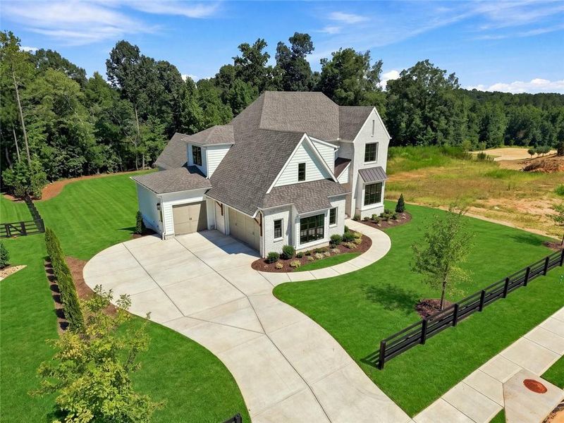 Front exterior of a new home in , Canton, GA, highlighting curb appeal (Image 25).