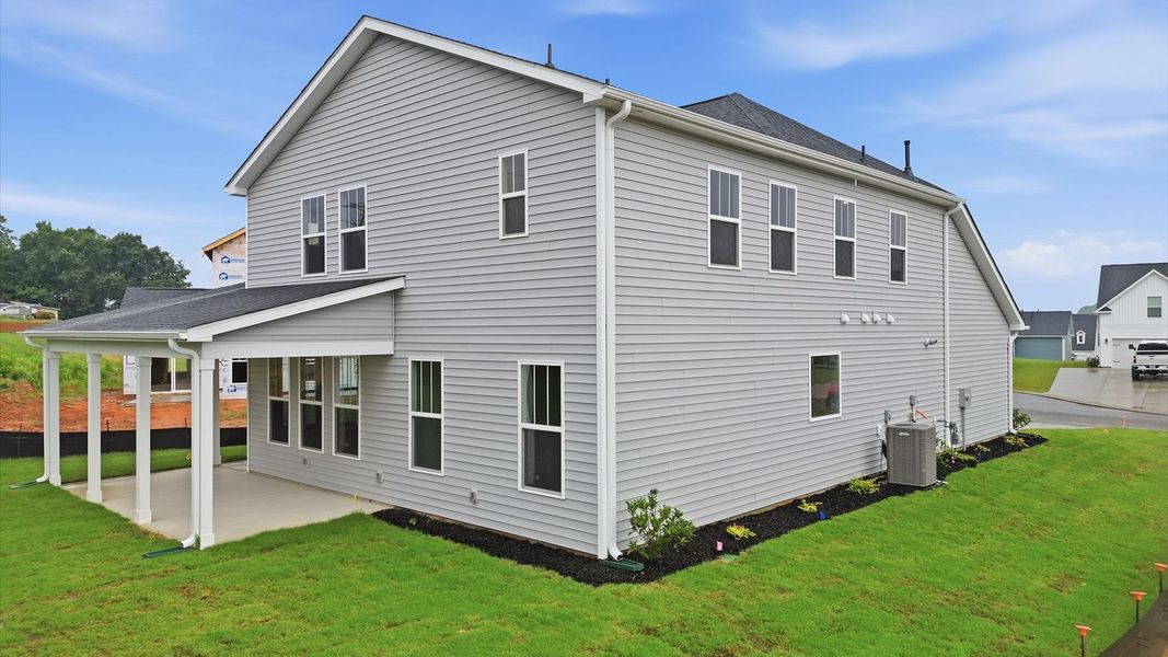 Highly functional rear covered porch adds memorable living space to this elegant home in Piedmont, SC Highly functional rear covered porch adds memorable living space to this elegant home in Piedmont, SC