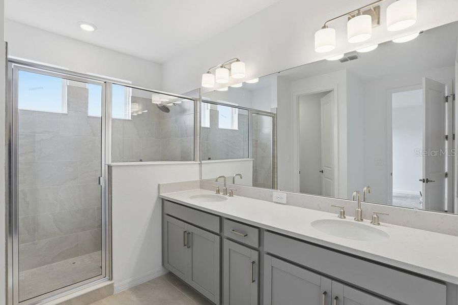 Furnished interior view inside a new home in Harvest at Ovation, Winter Garden (Image 10).