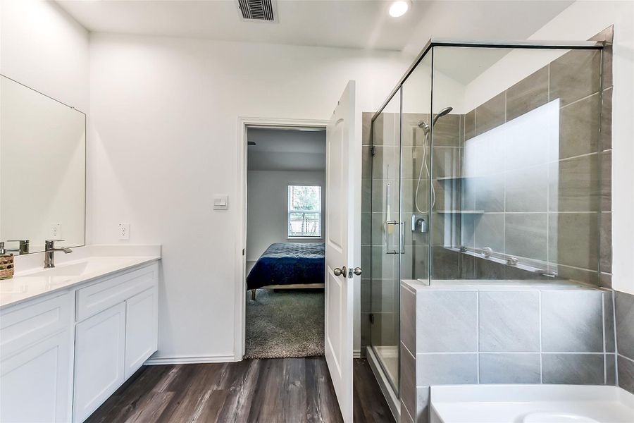 Furnished interior view inside a new home in Sunterra, Katy (Image 28).