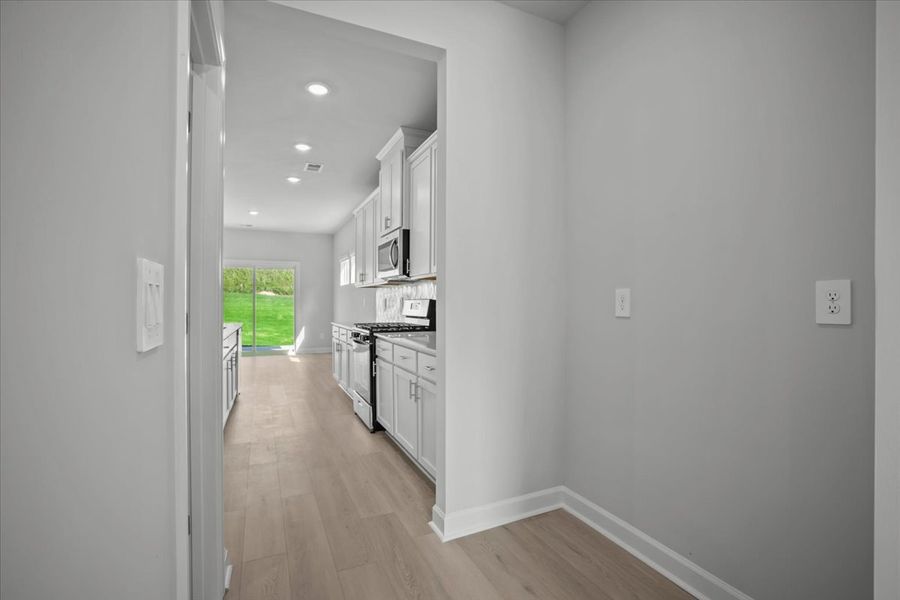 Spacious, unfurnished interior of a new home in The Farm at Wells Creek - Signature Collection, Gray Court (Image 20).