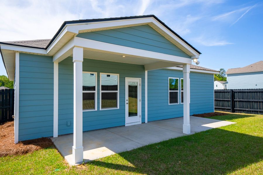 Exterior details and patio area of a home in Monroe Preserve, Chapin (Image 31).