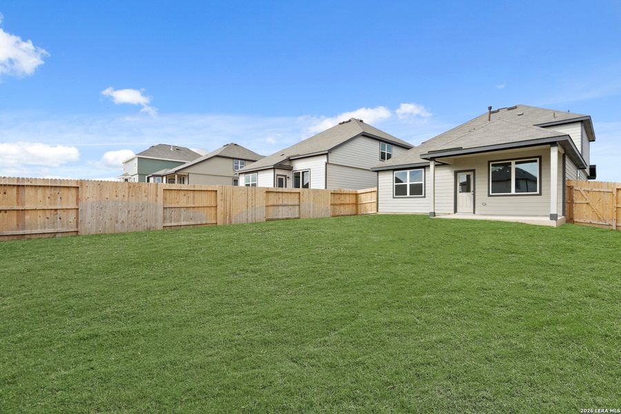 Exterior details and patio area of a home in Hickory Ridge, Elmendorf (Image 20).