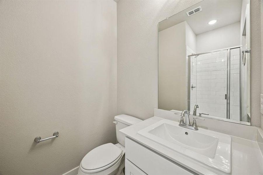 Bathroom in the Oscar home plan by Trophy Signature Homes – REPRESENTATIVE PHOTO Bathroom in the Oscar home plan by Trophy Signature Homes – REPRESENTATIVE PHOTO