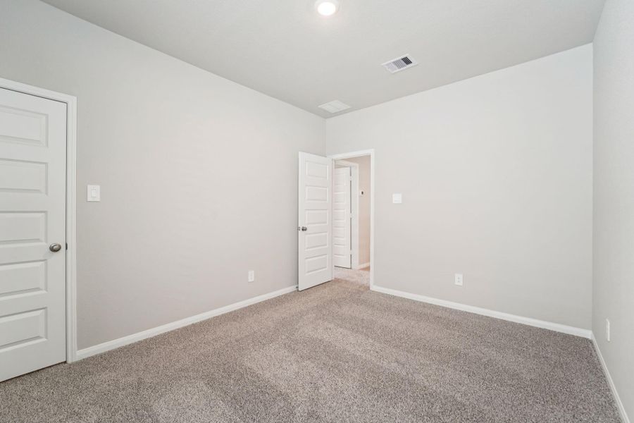 Spacious, unfurnished interior of a new home in Spring Brook Village - Luxe Series, Houston (Image 33). Spacious, unfurnished interior of a new home in Spring Brook Village - Luxe Series, Houston (Image 33).