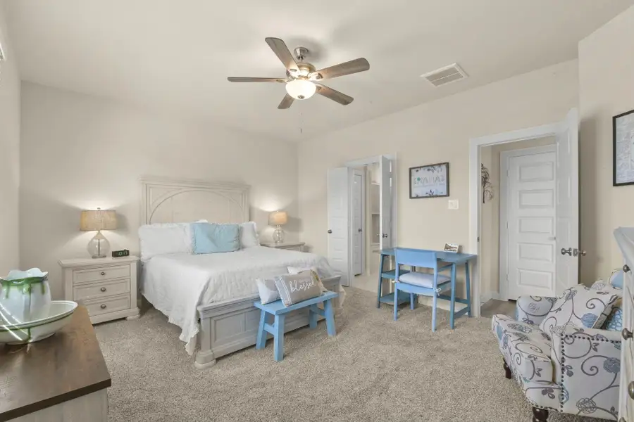 Furnished interior view inside a new home in Harper's Preserve - Traditional Series, Conroe (Image 7).