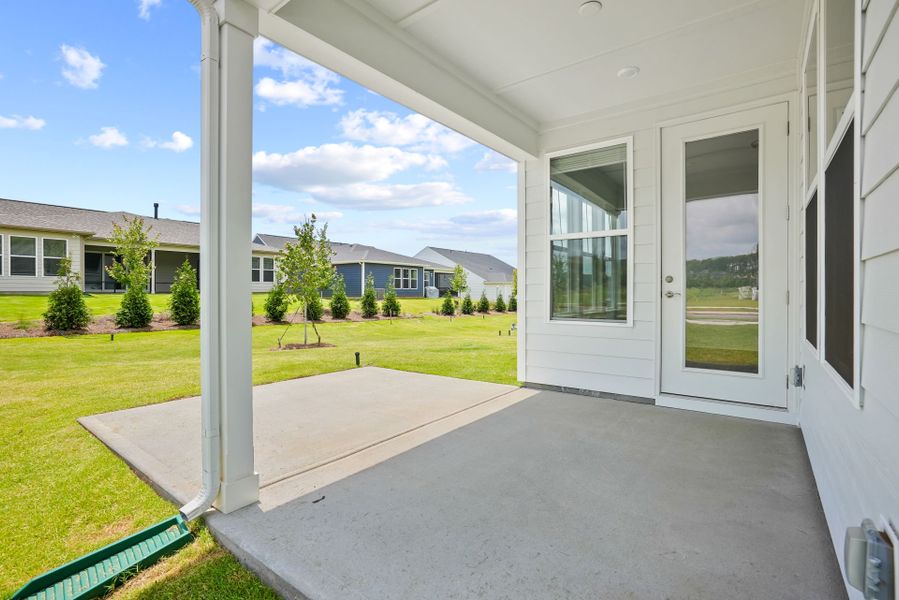 Exterior details and patio area of a home in Carolina Riverside, Belmont (Image 4).