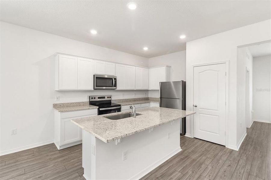 Furnished interior view inside a new home in Peach Crossings, Winter Haven (Image 4).