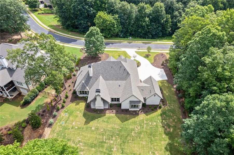 Front exterior of a new home in , Flowery Branch, GA, highlighting curb appeal (Image 31).