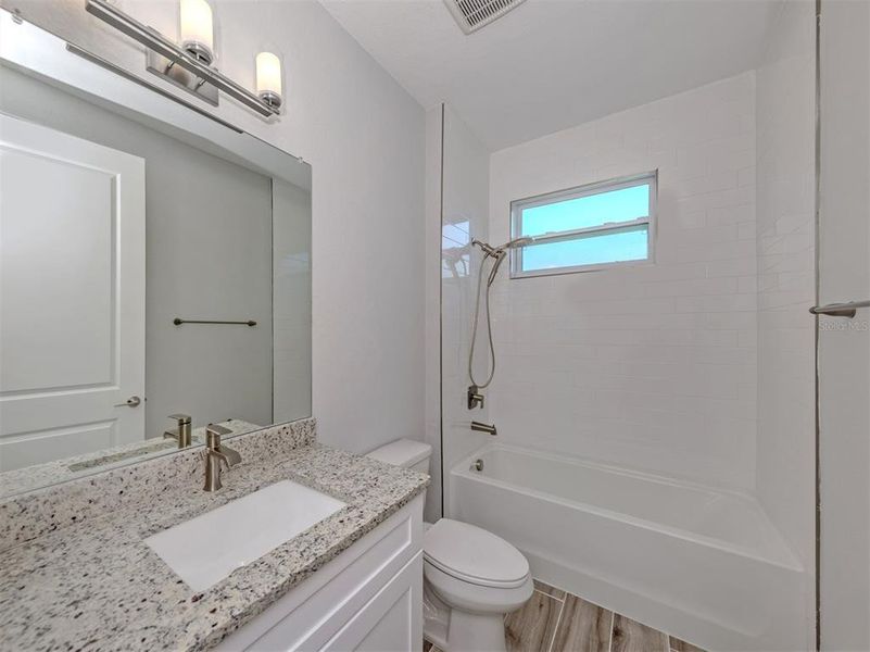 Furnished interior view inside a new home in , Port Charlotte (Image 11).