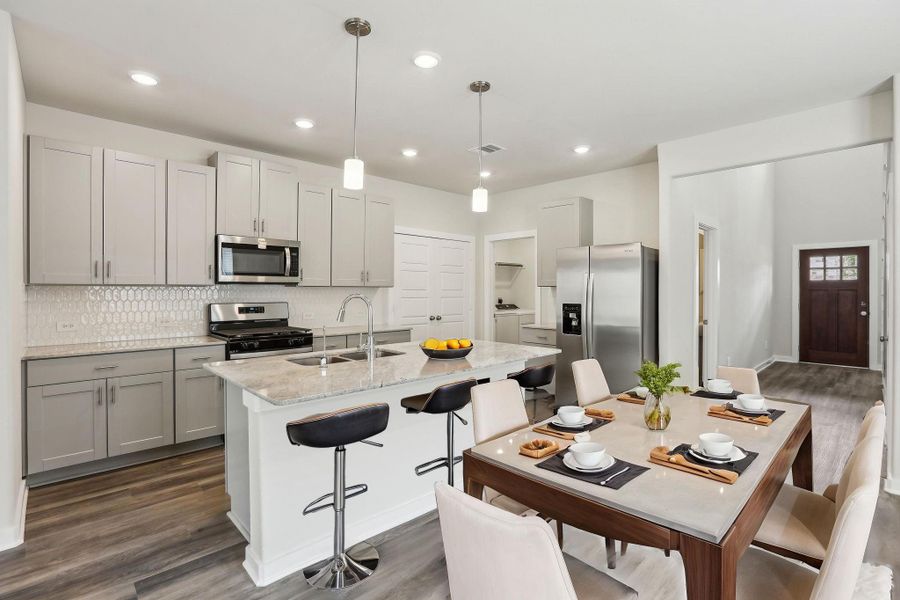 Photo is not of the actual home, but is an inspirational photo of builder’s model home and may depict options, furnishings, and/or decorator features that are not included