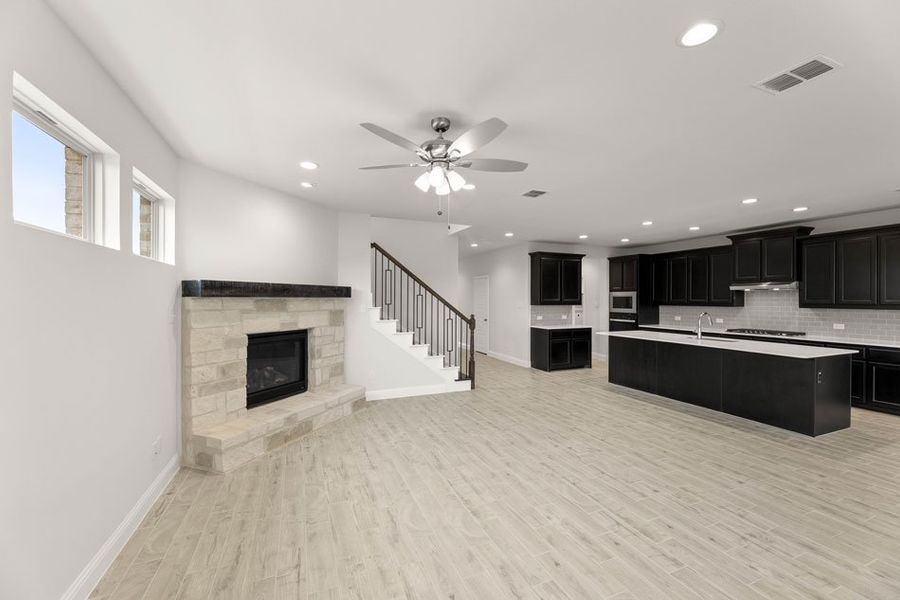 Representative exterior photo of a completed home built from the Winchester by Impression Homes in Timberbrook, Justin, TX (Image 8).