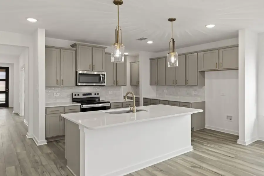 Representative furnished interior of a home built from the Katy Lakes Olive 2192 by Brohn Homes in Katy Lakes, Katy (Image 4).