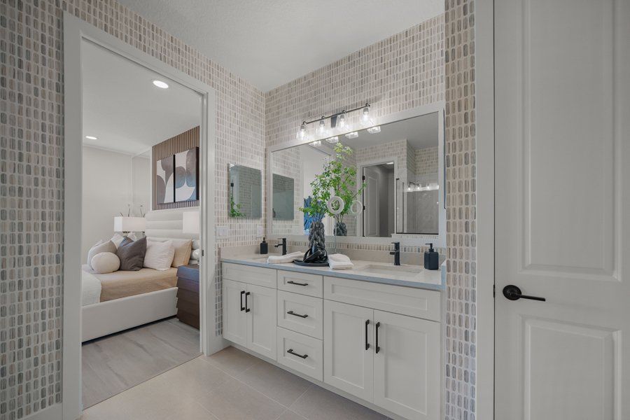 Representative furnished interior of a home built from the Galley by Homes by Towne in Shellstone at Waterside, Sarasota (Image 12). Representative furnished interior of a home built from the Galley by Homes by Towne in Shellstone at Waterside, Sarasota (Image 12).