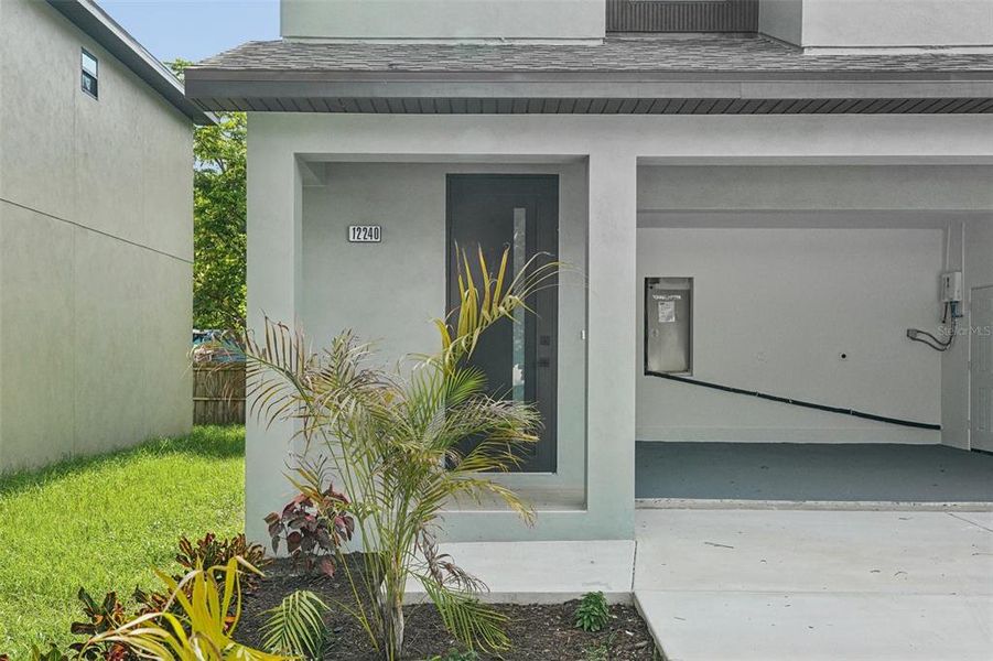 Front exterior of a new home in , Largo, FL, highlighting curb appeal (Image 2).