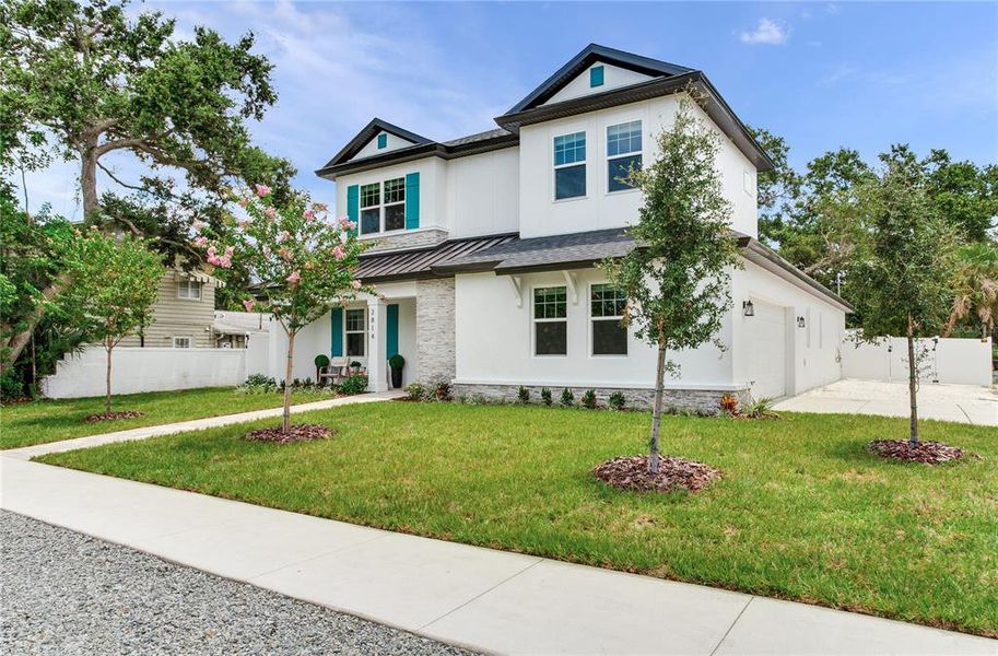 Front exterior of a new home in , Gulfport, FL, highlighting curb appeal (Image 31). Front exterior of a new home in , Gulfport, FL, highlighting curb appeal (Image 31).