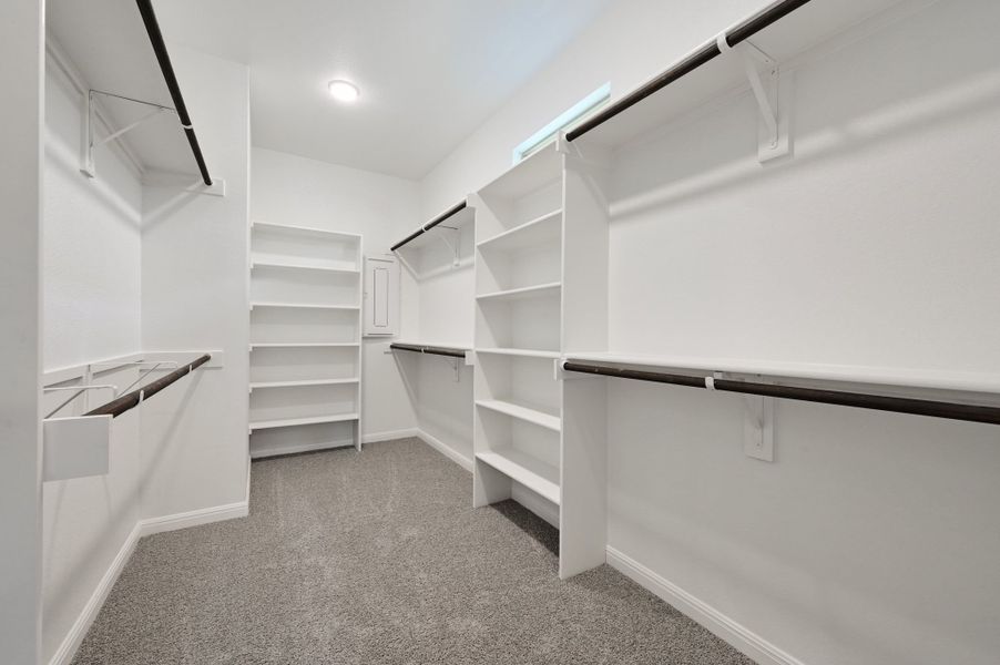 Primary Closet in the Willow home plan by Trophy Signature Homes – REPRESENTATIVE PHOTO Primary Closet in the Willow home plan by Trophy Signature Homes – REPRESENTATIVE PHOTO