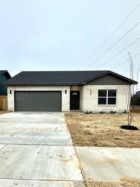 View of front of home with a garage