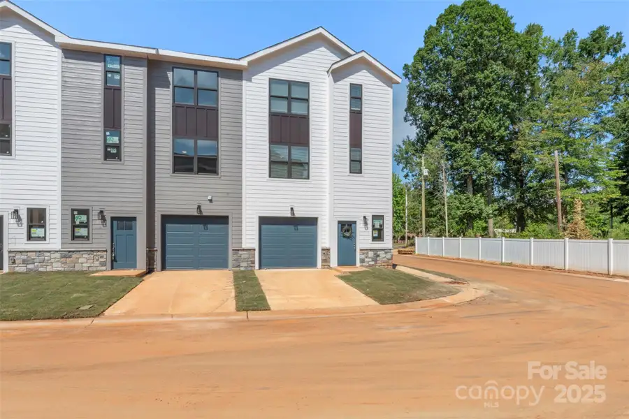 Exterior details and patio area of a home in , Charlotte (Image 1).