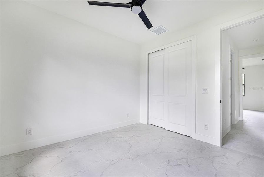 Spacious, unfurnished interior of a new home in , Port Charlotte (Image 34).