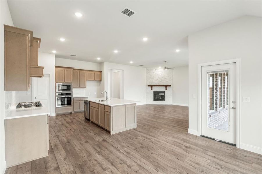 Furnished interior view inside a new home in Stone River Glen 60s, Royse City (Image 6).