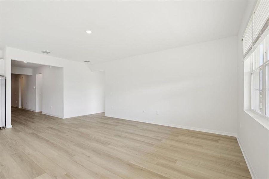 Spacious, unfurnished interior of a new home in Coasterra - Reserve Series, Palmetto (Image 21).