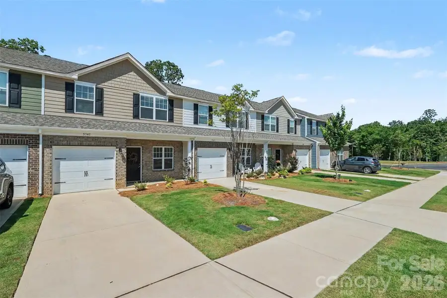 Front exterior of a new home in Autumn Brook, Stanley, NC, highlighting curb appeal (Image 22).